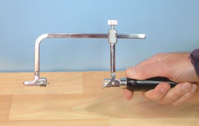 ADJUSTABLE PIERCING SAW FRAME