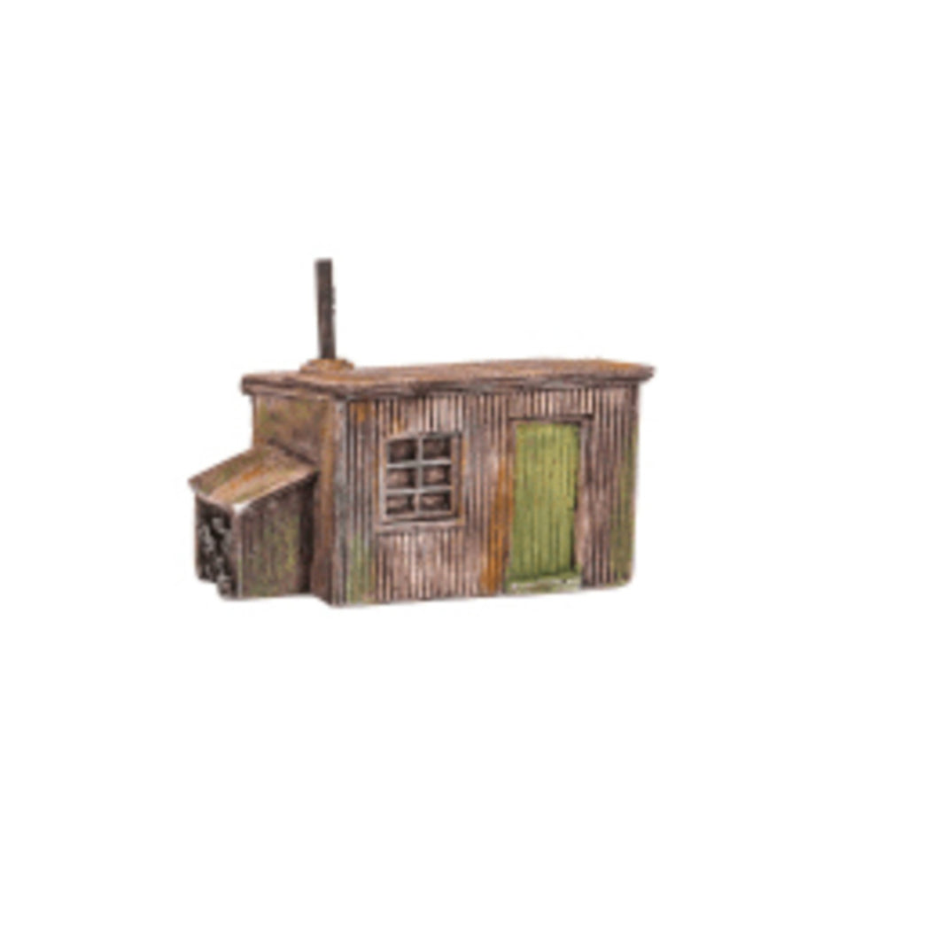 Corrugated Hut with Log Store